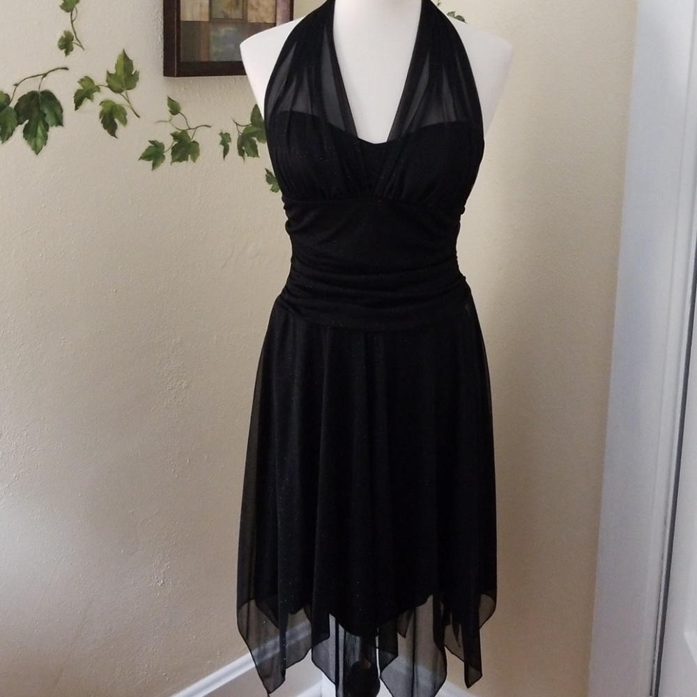 Beautiful shimmery handkerchief hem dress.